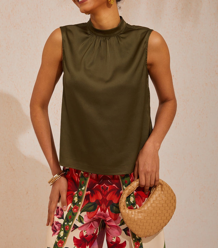 Silky satin sleeveless top with mock neck, featuring an elegant design for ladies, ideal for resort dinners and weekend brunches. 3