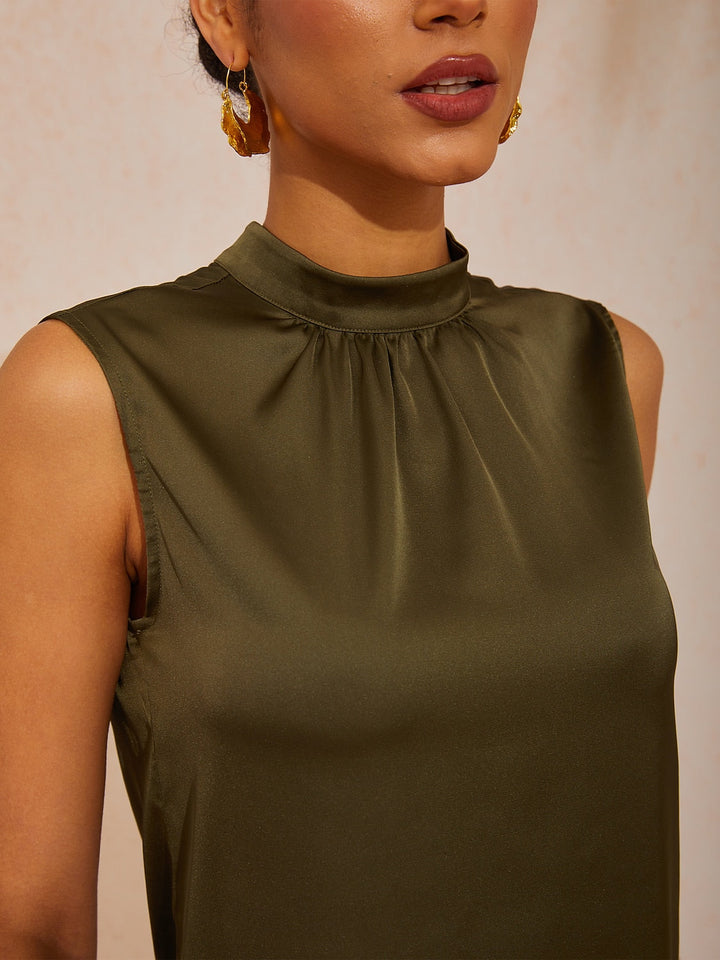 Silky satin sleeveless top with mock neck, featuring an elegant design for ladies, ideal for resort dinners and weekend brunches. 4