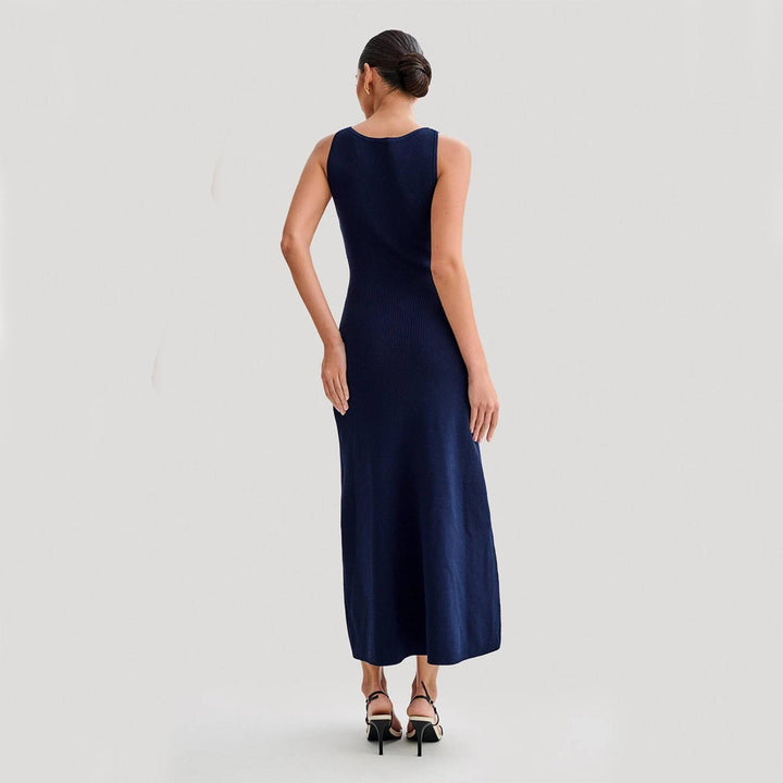 Sleeveless maxi dress featuring a button front, flap pockets, and a ribbed knit design, perfect for casual summer outings for women. 1