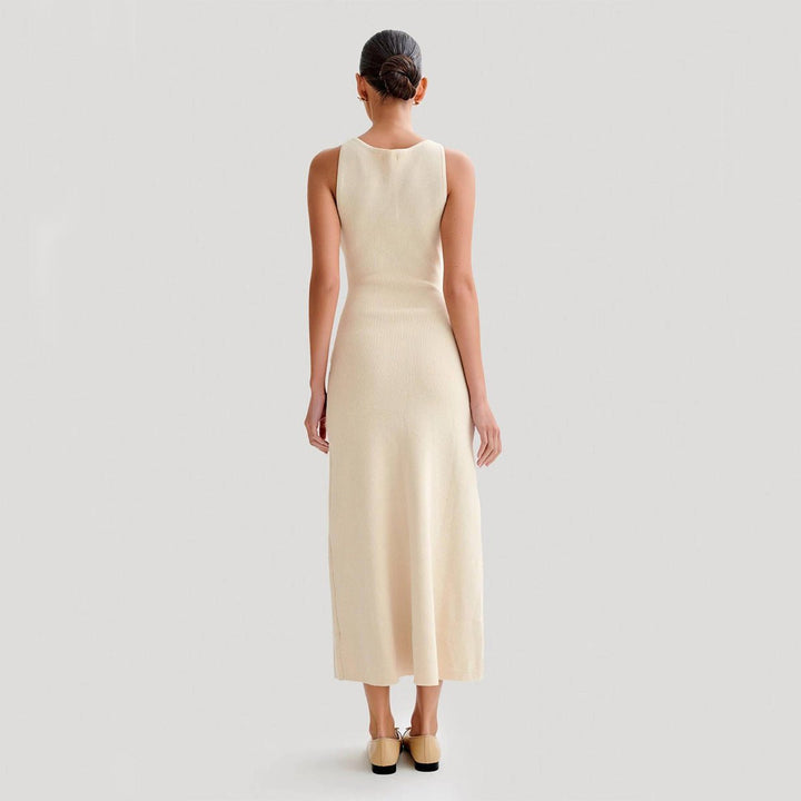 Sleeveless maxi dress featuring a button front, flap pockets, and a ribbed knit design, perfect for casual summer outings for women. 6