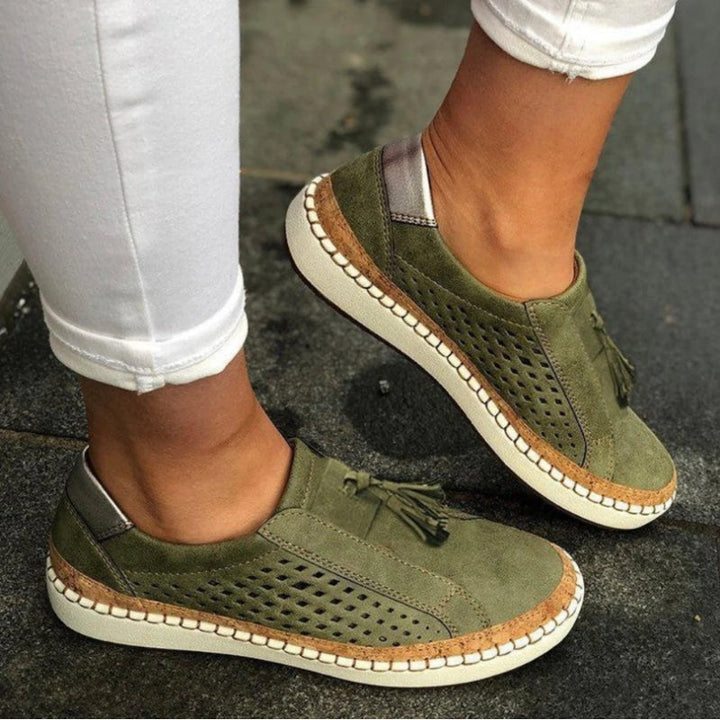Slip on shoes featuring arch support and a breathable knit upper, designed for lightweight comfort and non-slip traction on all terrains. 0