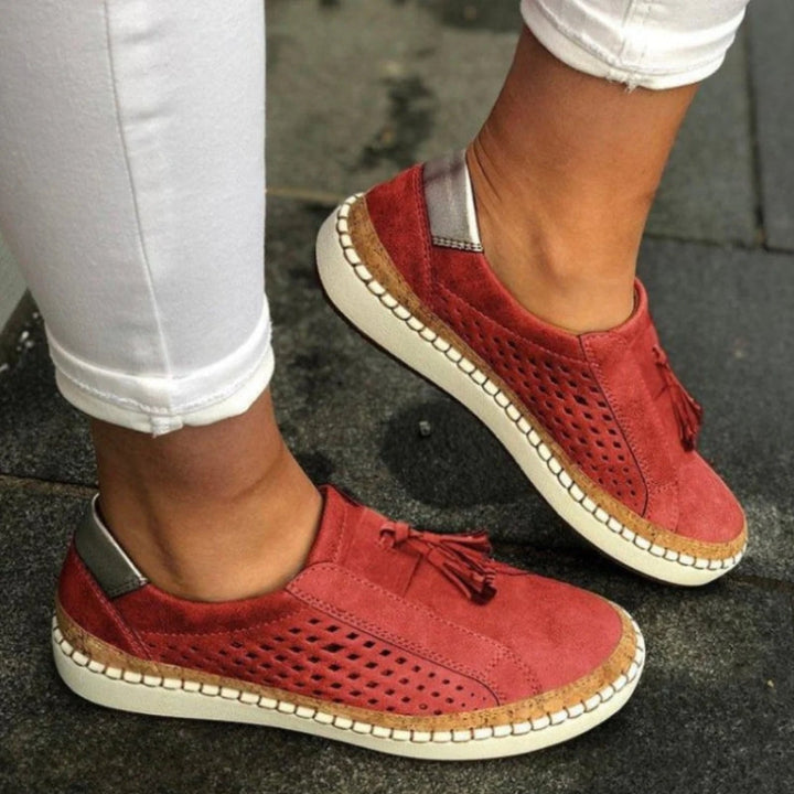 Slip on shoes featuring arch support and a breathable knit upper, designed for lightweight comfort and non-slip traction on all terrains. 1