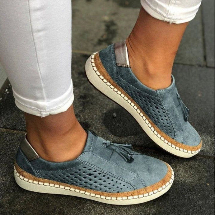 Slip on shoes featuring arch support and a breathable knit upper, designed for lightweight comfort and non-slip traction on all terrains. 3