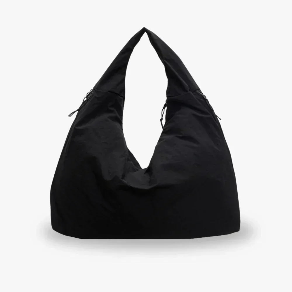 Slouchy hobo shoulder bag with adjustable toggles, large everyday tote for women in stylish design and versatile colors. 0
