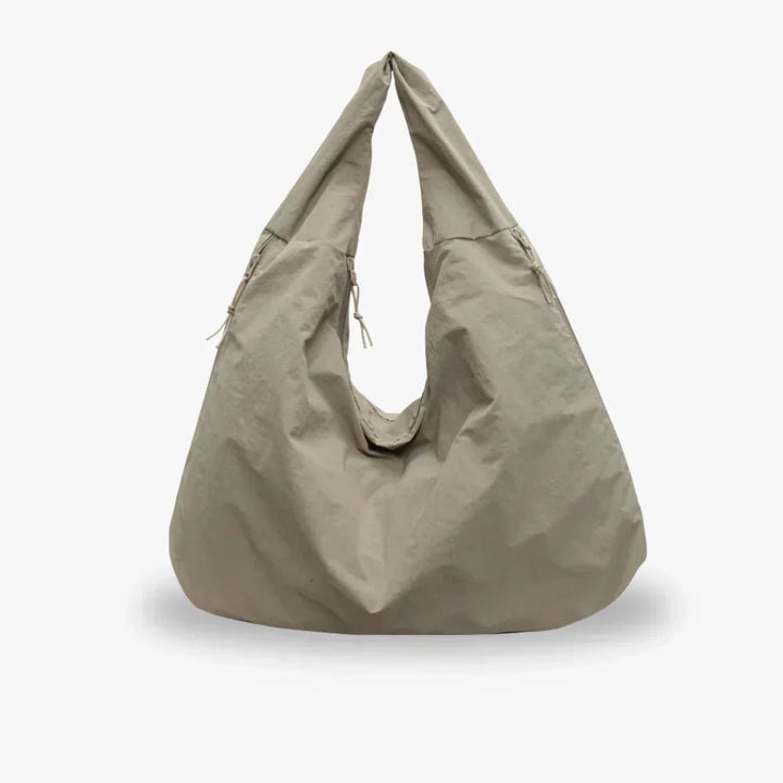 Slouchy hobo shoulder bag with adjustable toggles, large everyday tote for women in stylish design and versatile colors. 6