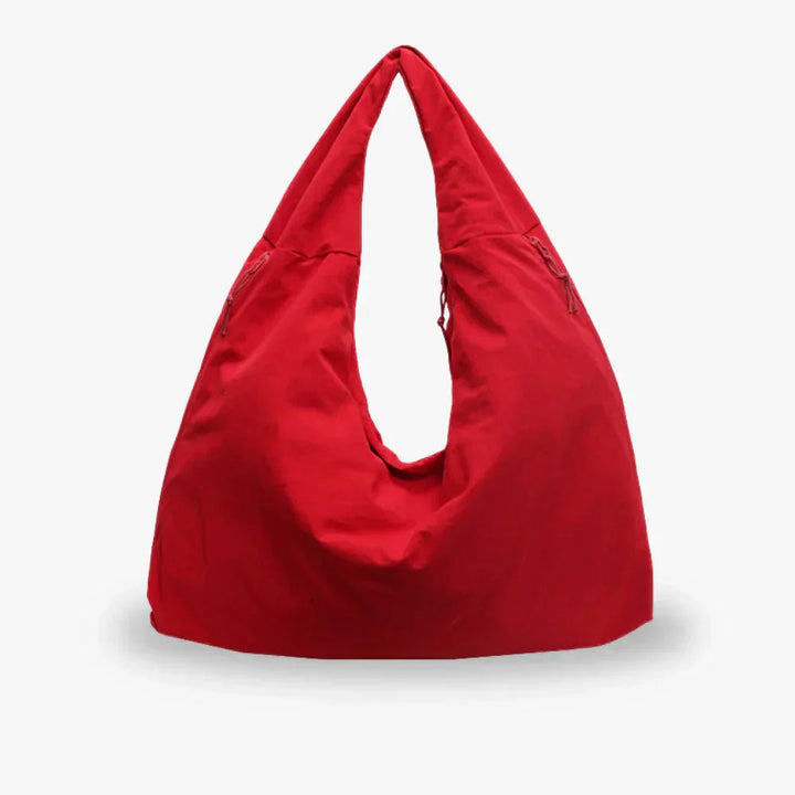 Slouchy hobo shoulder bag with adjustable toggles, large everyday tote for women in stylish design and versatile colors. 9