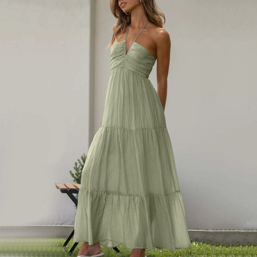 Tiered maxi dress featuring an adjustable halter neckline, made from lightweight breathable fabric, perfect for both casual and formal occasions. 7