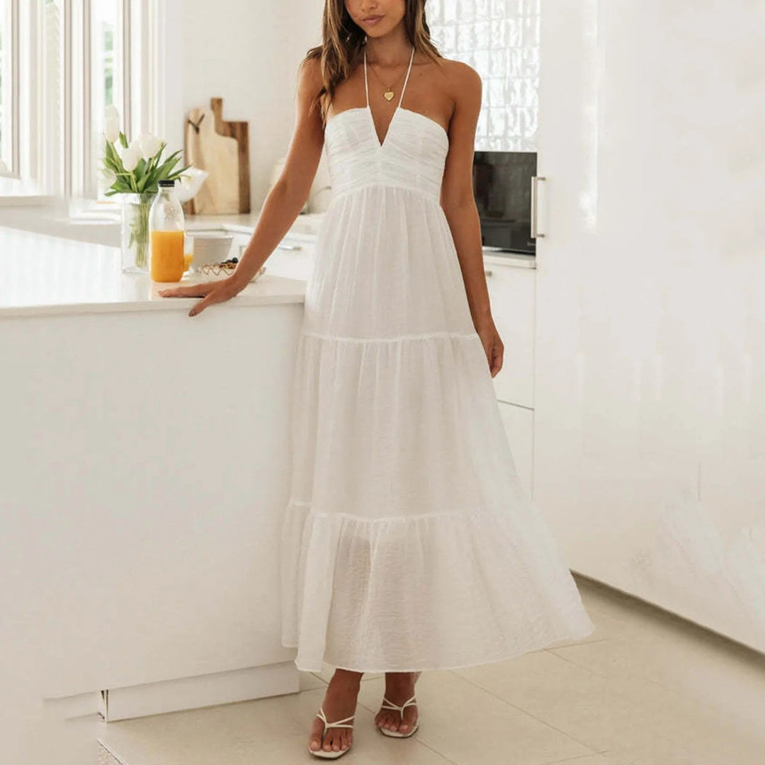 Tiered maxi dress featuring an adjustable halter neckline, made from lightweight breathable fabric, perfect for both casual and formal occasions. 9