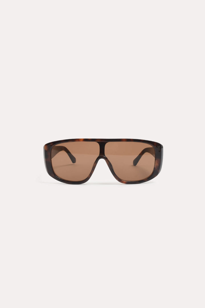 Tortoiseshell sunglasses featuring brown lenses and stylish metal accents, designed with a classic fixed nose bridge for a timeless look. 0