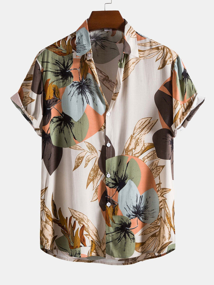 Tropical print shirt paired with textured cotton shorts, featuring a regular fit and 5-inch inseam, perfect for summer outings. 1