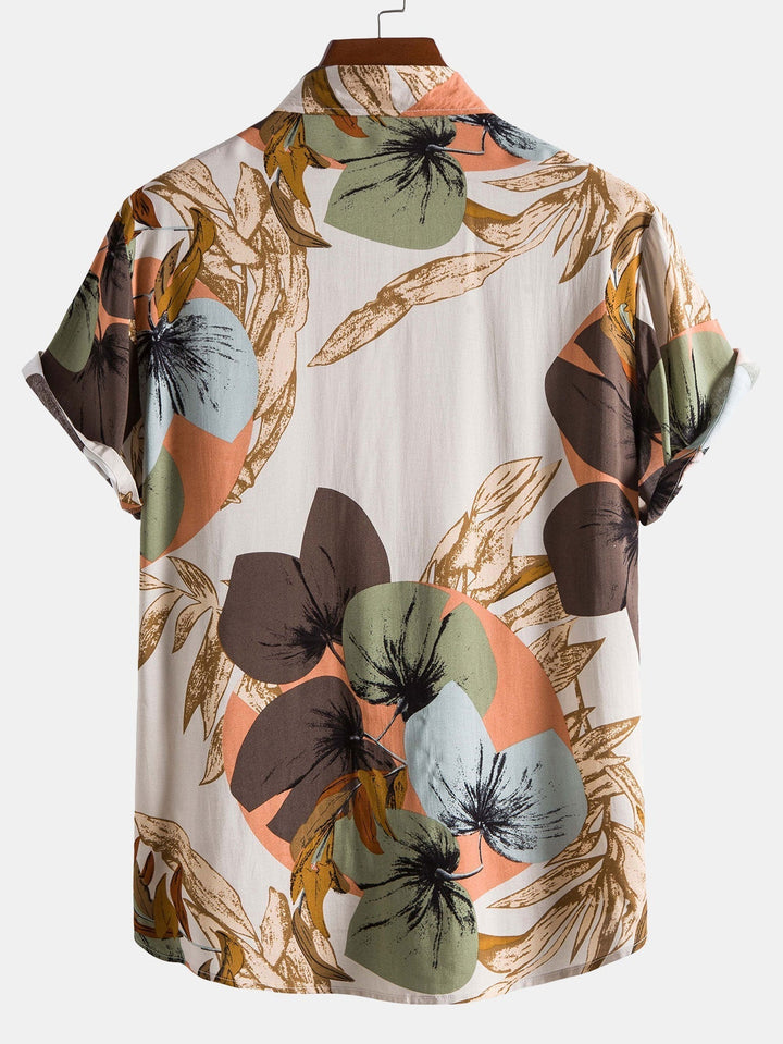 Tropical print shirt paired with textured cotton shorts, featuring a regular fit and 5-inch inseam, perfect for summer outings. 2