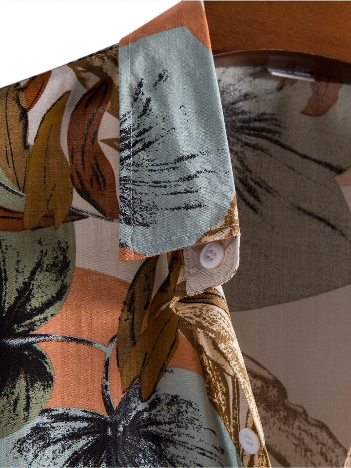 Tropical print shirt paired with textured cotton shorts, featuring a regular fit and 5-inch inseam, perfect for summer outings. 5