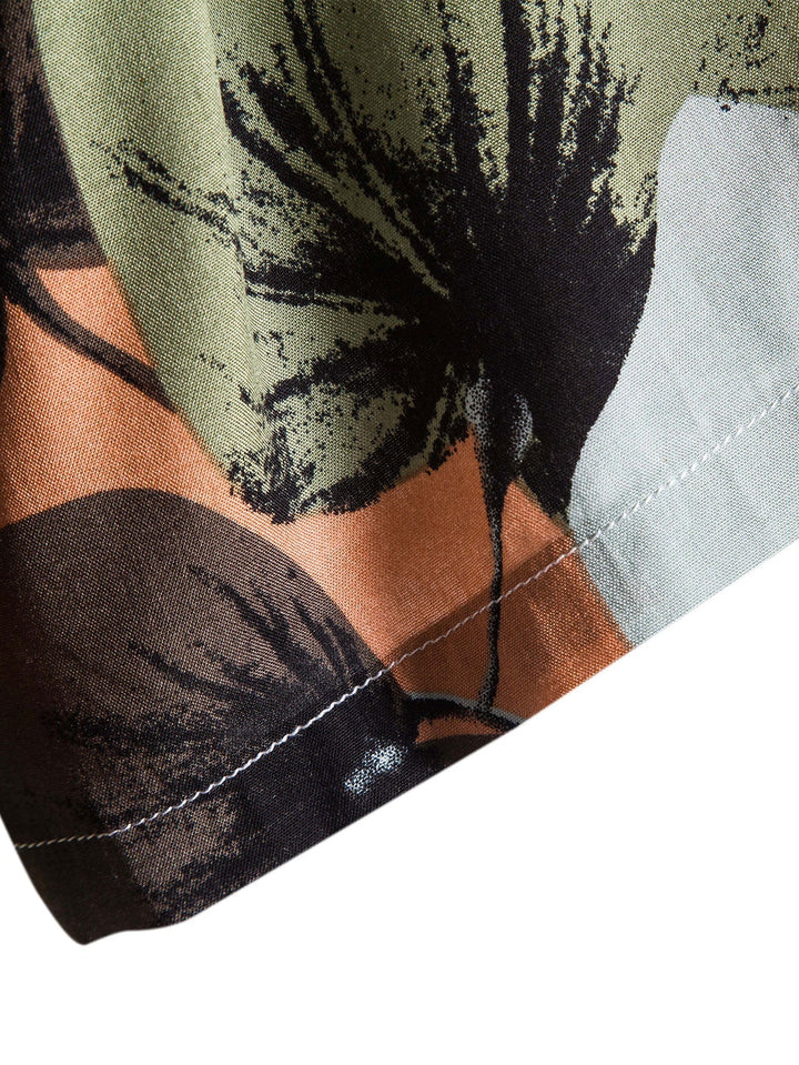 Tropical print shirt paired with textured cotton shorts, featuring a regular fit and 5-inch inseam, perfect for summer outings. 7
