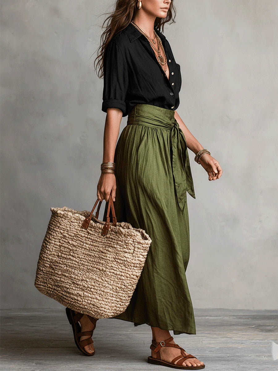 Two-piece women's outfit set featuring a stylish black button shirt and an olive green midi skirt, designed for plus size clothing. 1