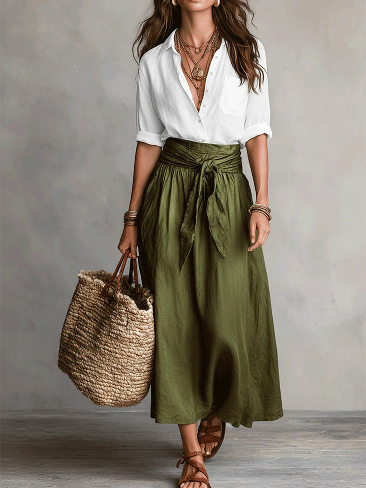 Two-piece women's outfit set featuring a stylish black button shirt and an olive green midi skirt, designed for plus size clothing. 5