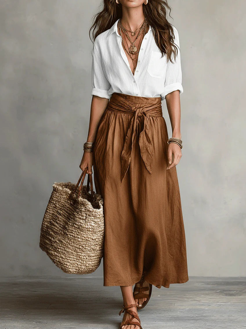 Two-piece women's outfit set featuring a stylish black button shirt and an olive green midi skirt, designed for plus size clothing. 6