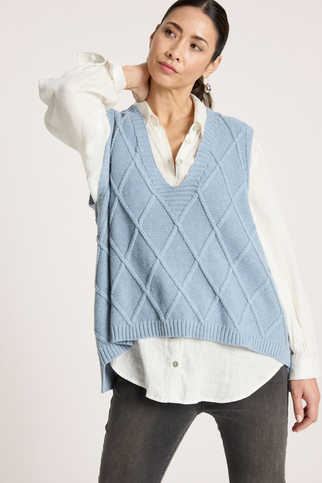 V-Neck Knitted Vest for Women in Breathable Cotton featuring a trendy checkerboard pattern, perfect for stylish layering. 4