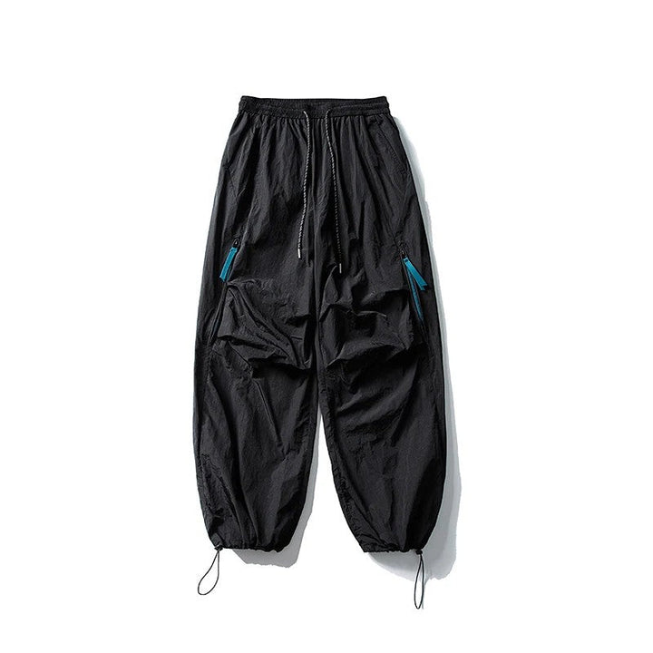 Waterproof hiking pants featuring quick-dry fabric and a comfort stretch waist, designed for durability and flexibility during outdoor trekking for both men and women. 0