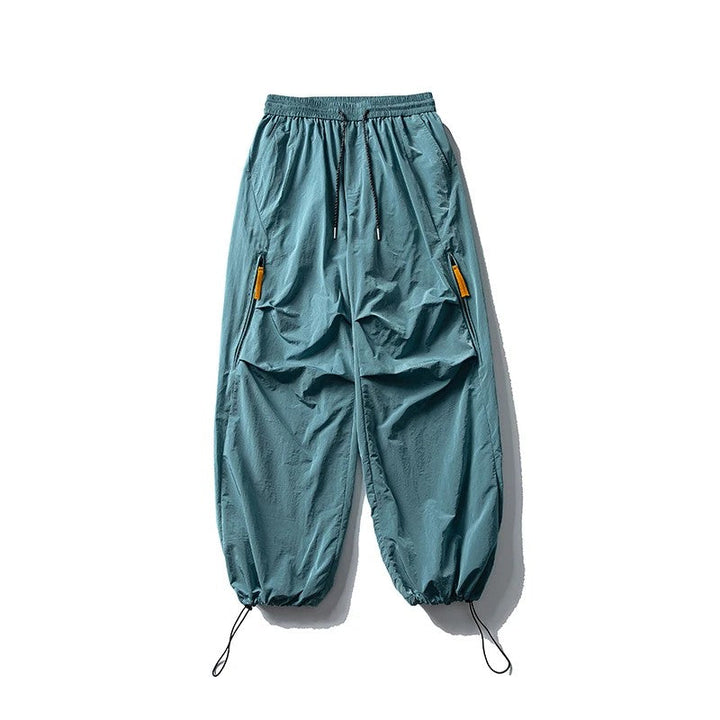 Waterproof hiking pants featuring quick-dry fabric and a comfort stretch waist, designed for durability and flexibility during outdoor trekking for both men and women. 3