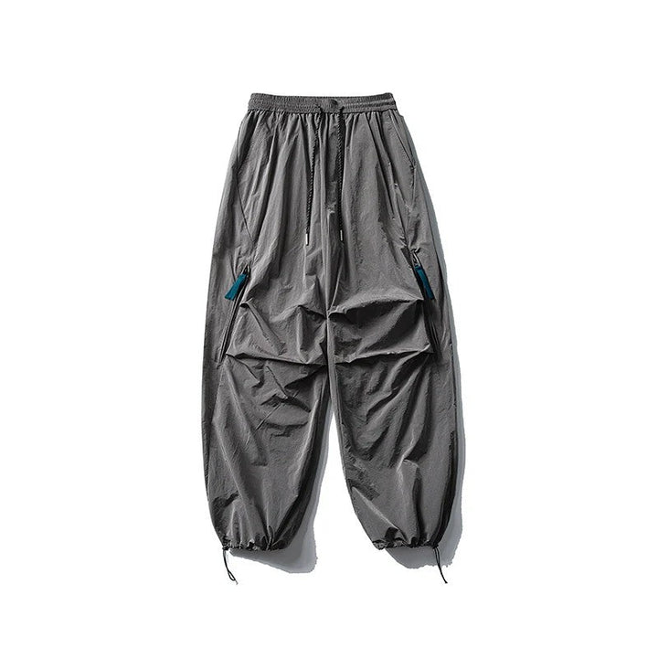 Waterproof hiking pants featuring quick-dry fabric and a comfort stretch waist, designed for durability and flexibility during outdoor trekking for both men and women. 4