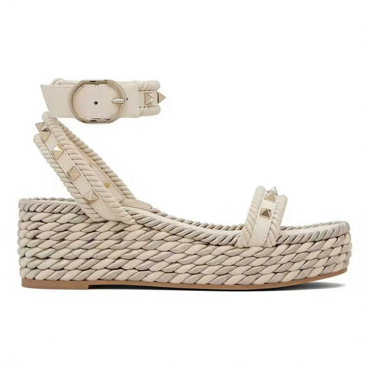 Wedge sandals for women featuring a studded ankle strap and Roman-inspired elevated platform heels, perfect for stylish summer outfits. 0