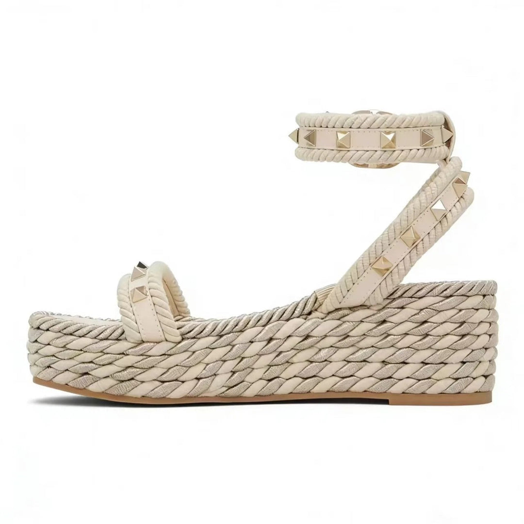 Wedge sandals for women featuring a studded ankle strap and Roman-inspired elevated platform heels, perfect for stylish summer outfits. 4