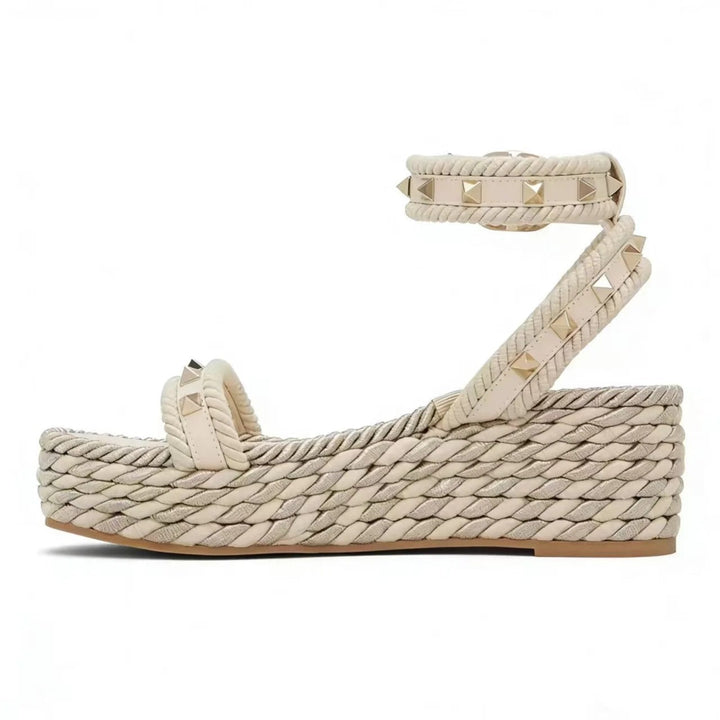 Wedge sandals for women featuring a studded ankle strap and Roman-inspired elevated platform heels, perfect for stylish summer outfits. 4