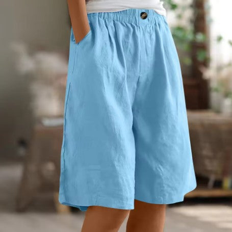 Wide leg Bermuda shorts for women featuring an elastic waist and convenient side pockets, designed for a casual knee-length fit perfect for summer outings. 6