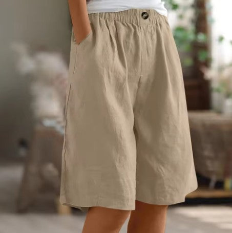 Wide leg Bermuda shorts for women featuring an elastic waist and convenient side pockets, designed for a casual knee-length fit perfect for summer outings. 7