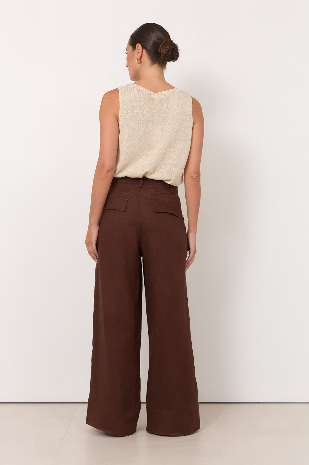 Wide leg linen pants for women in chocolate color, featuring a zip fly and pockets, perfect for casual style and comfortable wear. 5