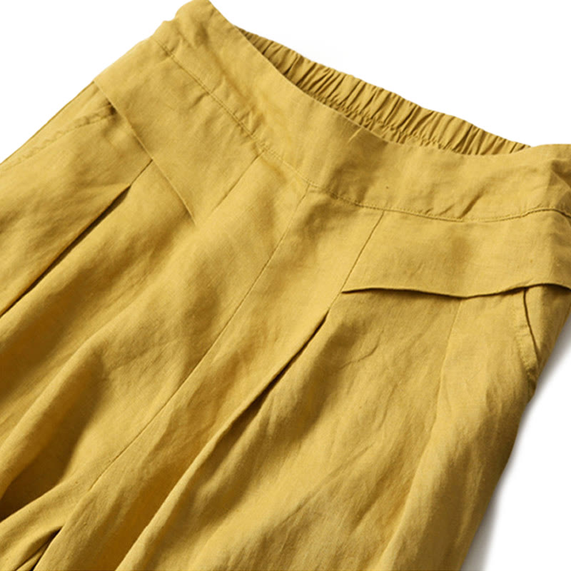 Wide leg pants for women featuring a high waist design, pockets, and made from a flowy cotton-linen blend for casual comfort and style. 1