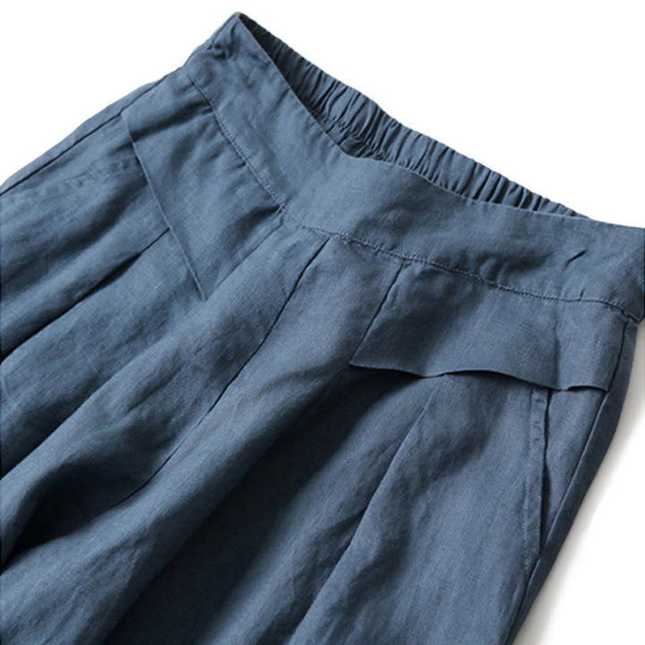 Wide leg pants for women featuring a high waist design, pockets, and made from a flowy cotton-linen blend for casual comfort and style. 6