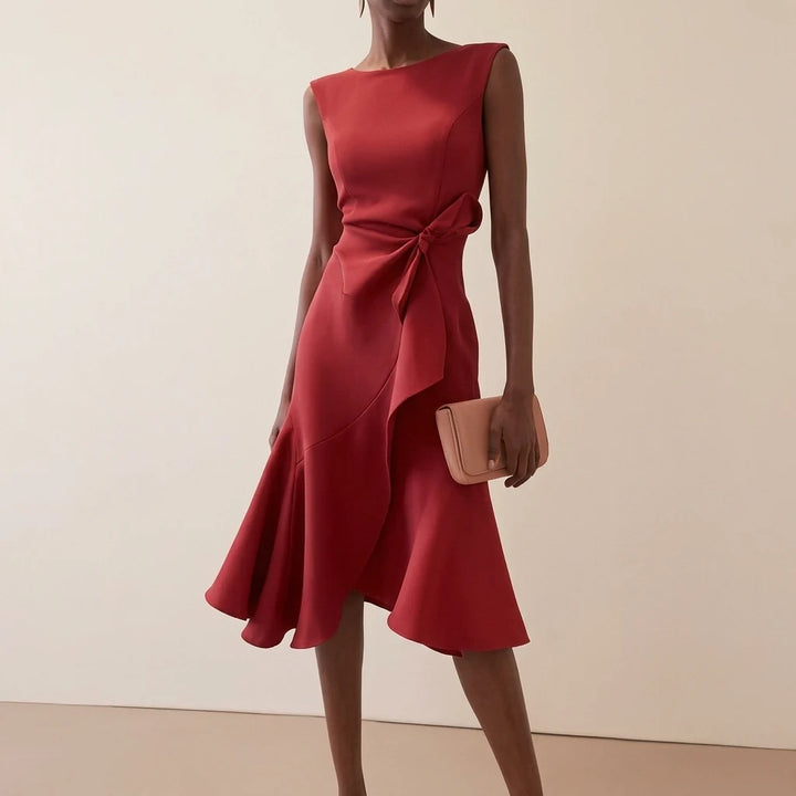 Women's asymmetrical midi dress featuring elegant draped detail, perfect for summer cocktail parties and formal occasions. 0