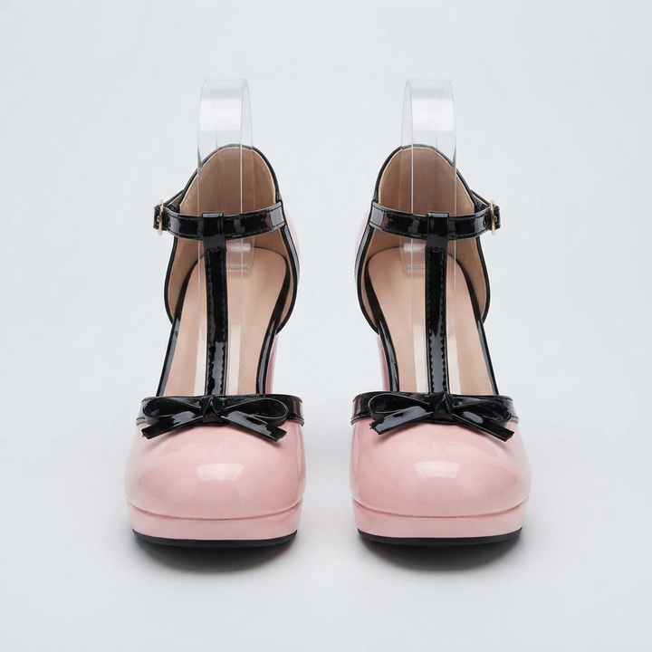 Women's black block heels featuring an adjustable buckle and faux patent leather T-strap design, ideal for stylish and comfortable wear. 0