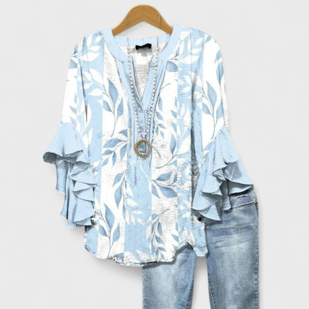 Women's blouse featuring ruffled sleeves, designed for summer with a lightweight fabric, perfect for an elegant casual style. 2