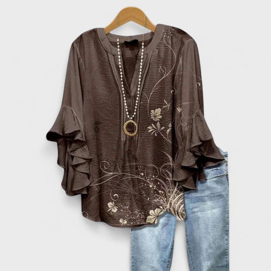 Women's blouse featuring ruffled sleeves, designed for summer with a lightweight fabric, perfect for an elegant casual style. 4