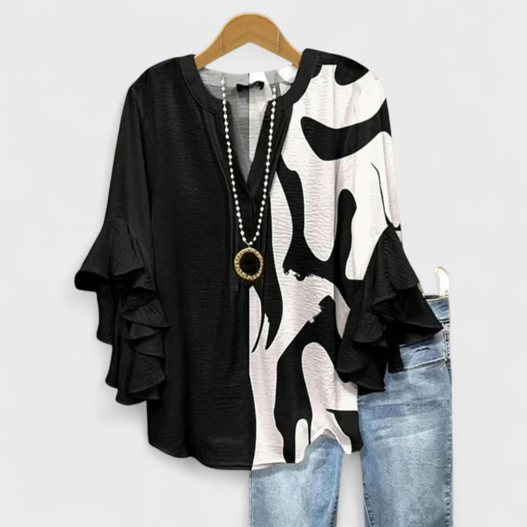 Women's blouse featuring ruffled sleeves, designed for summer with a lightweight fabric, perfect for an elegant casual style. 5