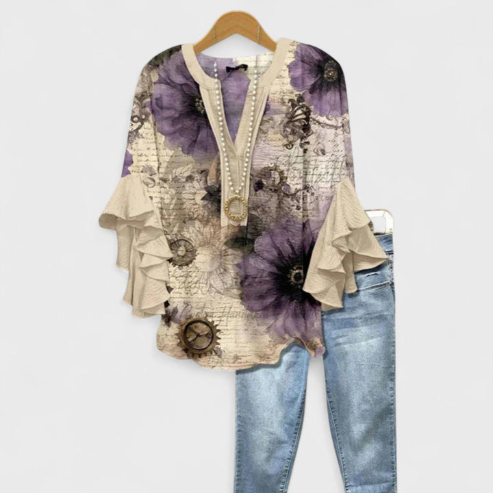 Women's blouse featuring ruffled sleeves, designed for summer with a lightweight fabric, perfect for an elegant casual style. 6