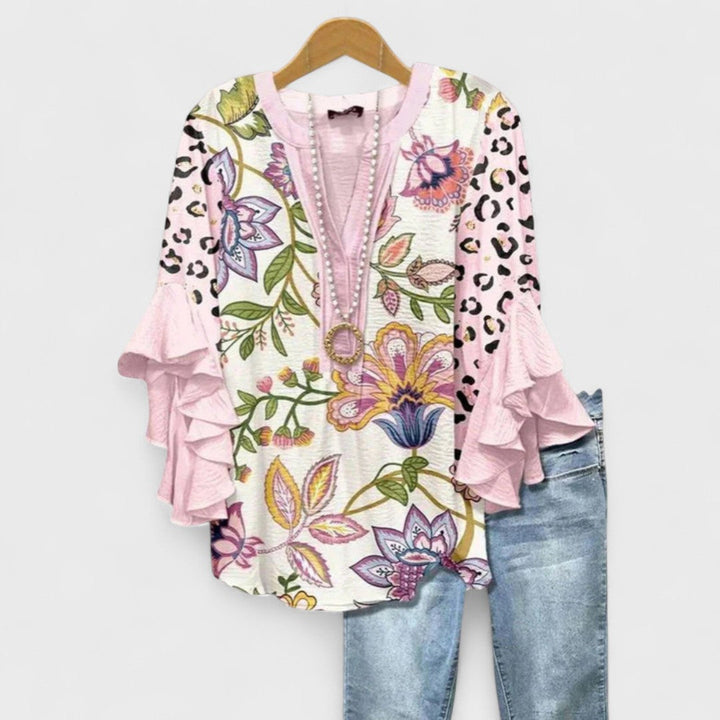 Women's blouse featuring ruffled sleeves, designed for summer with a lightweight fabric, perfect for an elegant casual style. 8