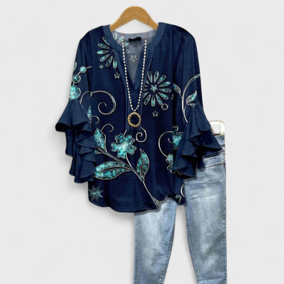 Women's blouse featuring ruffled sleeves, designed for summer with a lightweight fabric, perfect for an elegant casual style. 9