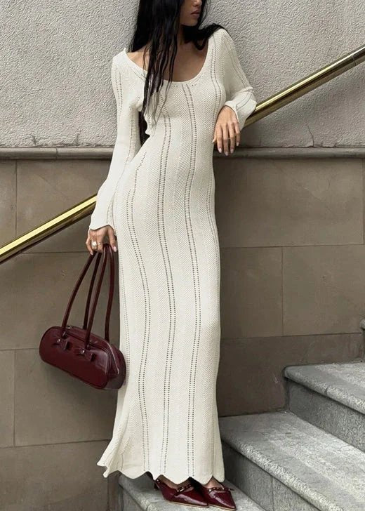 Women's bodycon maxi dress featuring long sleeves and a scoop neckline, crafted from textured knit fabric, perfect for elegant evening wear. 2