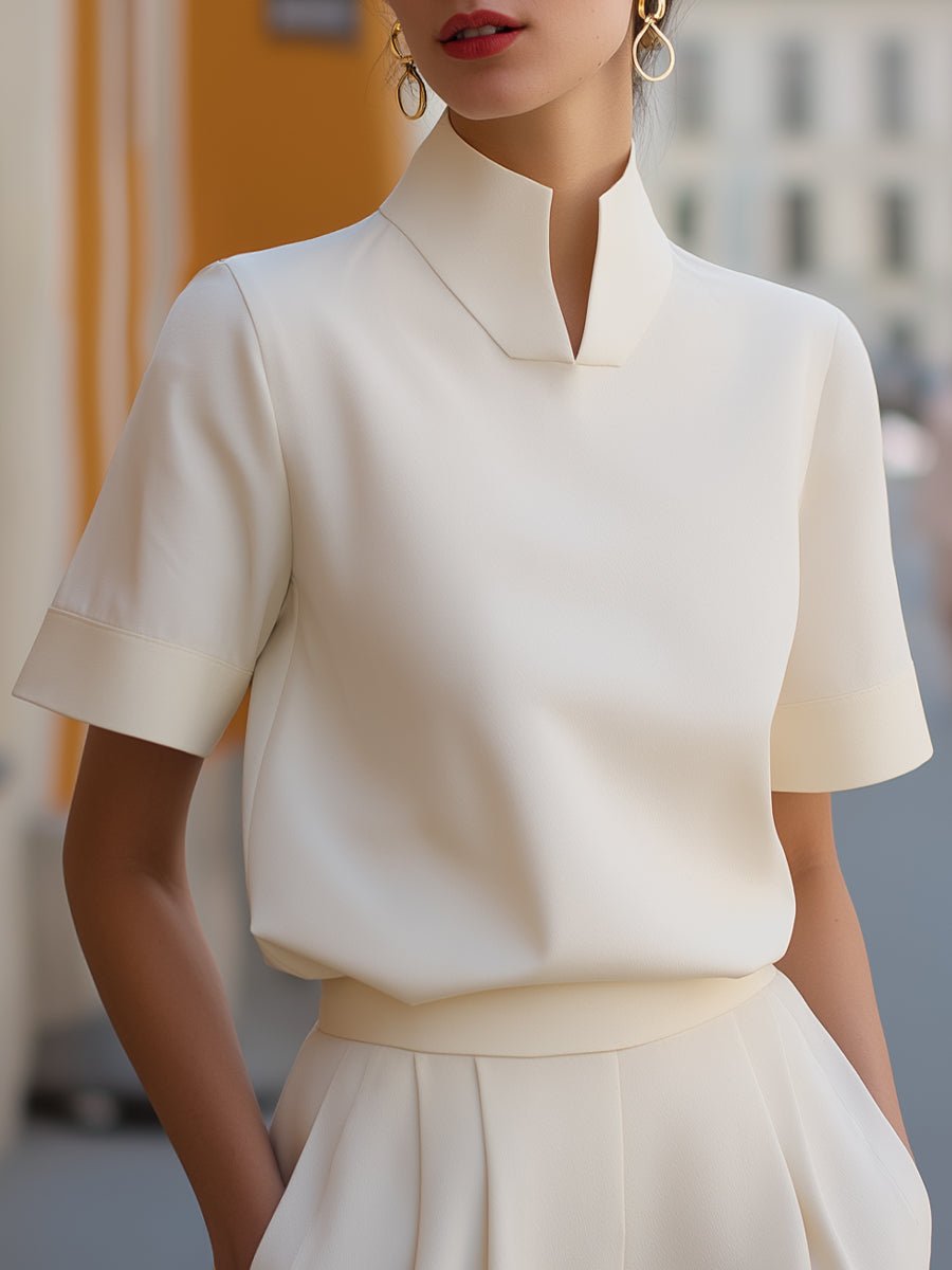 Women's business blouse featuring a stylish stand-up collar and short sleeves, designed for an elegant and modern look, perfect for professional settings. 0