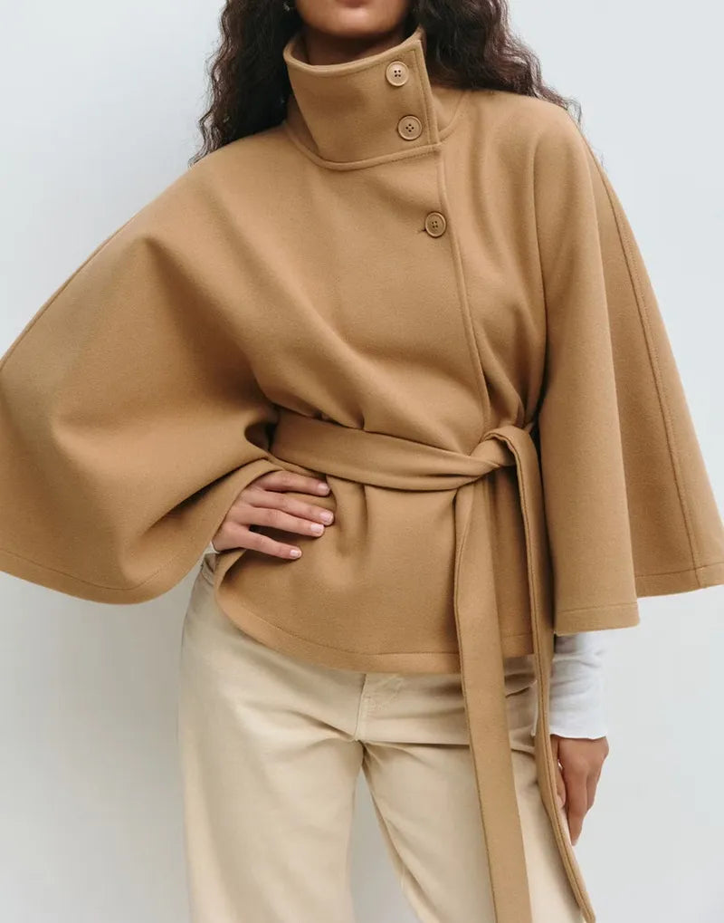Women's cape coat featuring an adjustable belt and high neckline, crafted from soft premium fabric for elegant winter layering. 2