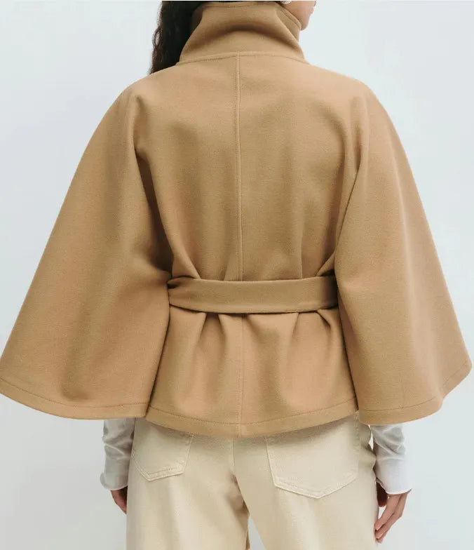 Women's cape coat featuring an adjustable belt and high neckline, crafted from soft premium fabric for elegant winter layering. 3