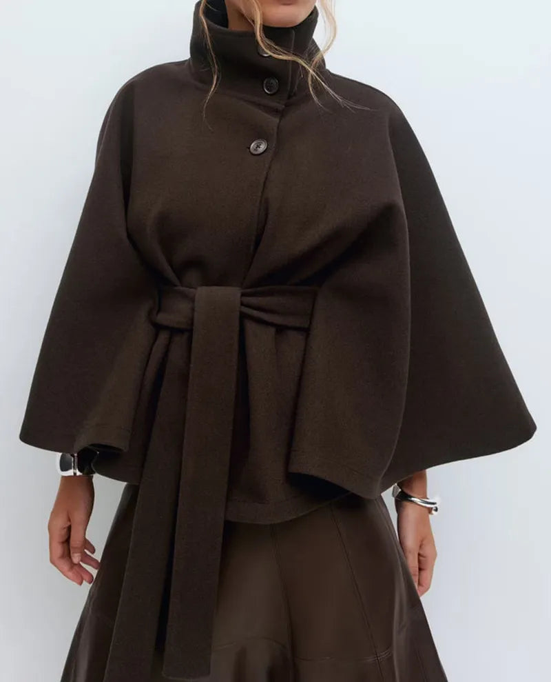 Women's cape coat featuring an adjustable belt and high neckline, crafted from soft premium fabric for elegant winter layering. 6