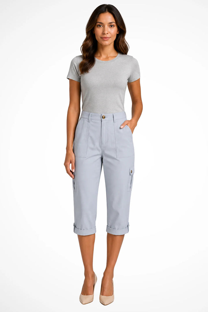 Women's relaxed fit capri pants in a soft cotton blend featuring cuffed ankles and convenient cargo pockets, perfect for casual outings and comfortable wear. 6