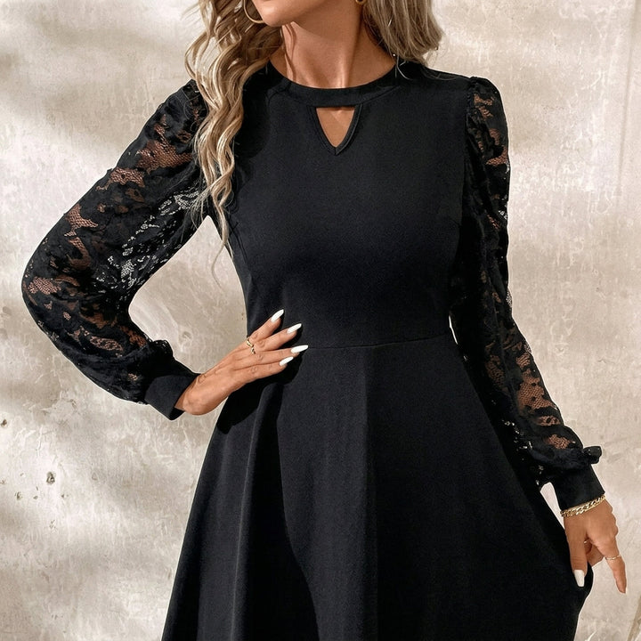 Women's flared A-line mini cocktail dress featuring elegant floral jacquard sleeves and a stylish geometric keyhole neckline, perfect for special occasions. 4
