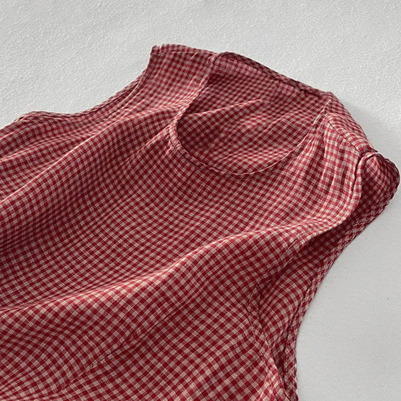 Women's cotton midi dress featuring a stylish plaid pattern, sleeveless design, and convenient pockets, available in plus size options for a comfortable summer look. 7