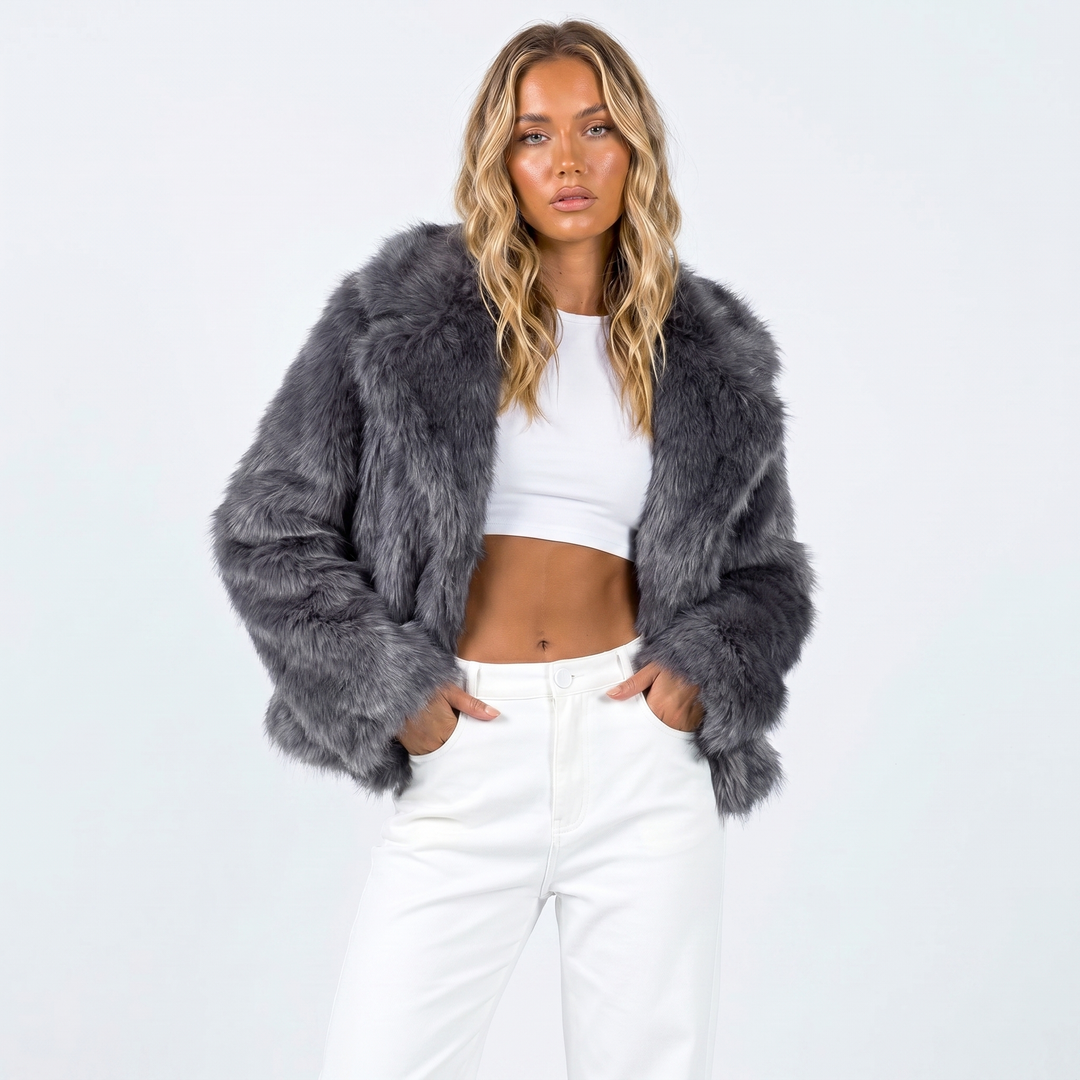 Women's faux fur jacket featuring an oversized collar, designed with a relaxed cropped fit in a stylish neutral tone, perfect for layering and adding warmth to any outfit 2