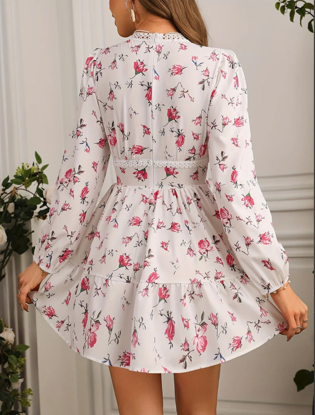 Women's floral mini dress featuring balloon sleeves and a crochet lace V-neck, perfect for summer outings and warm weather occasions. 3